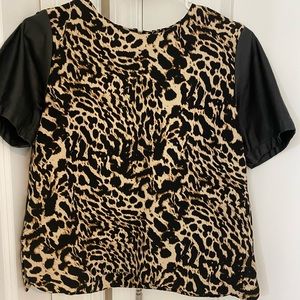 Animal print shirt.